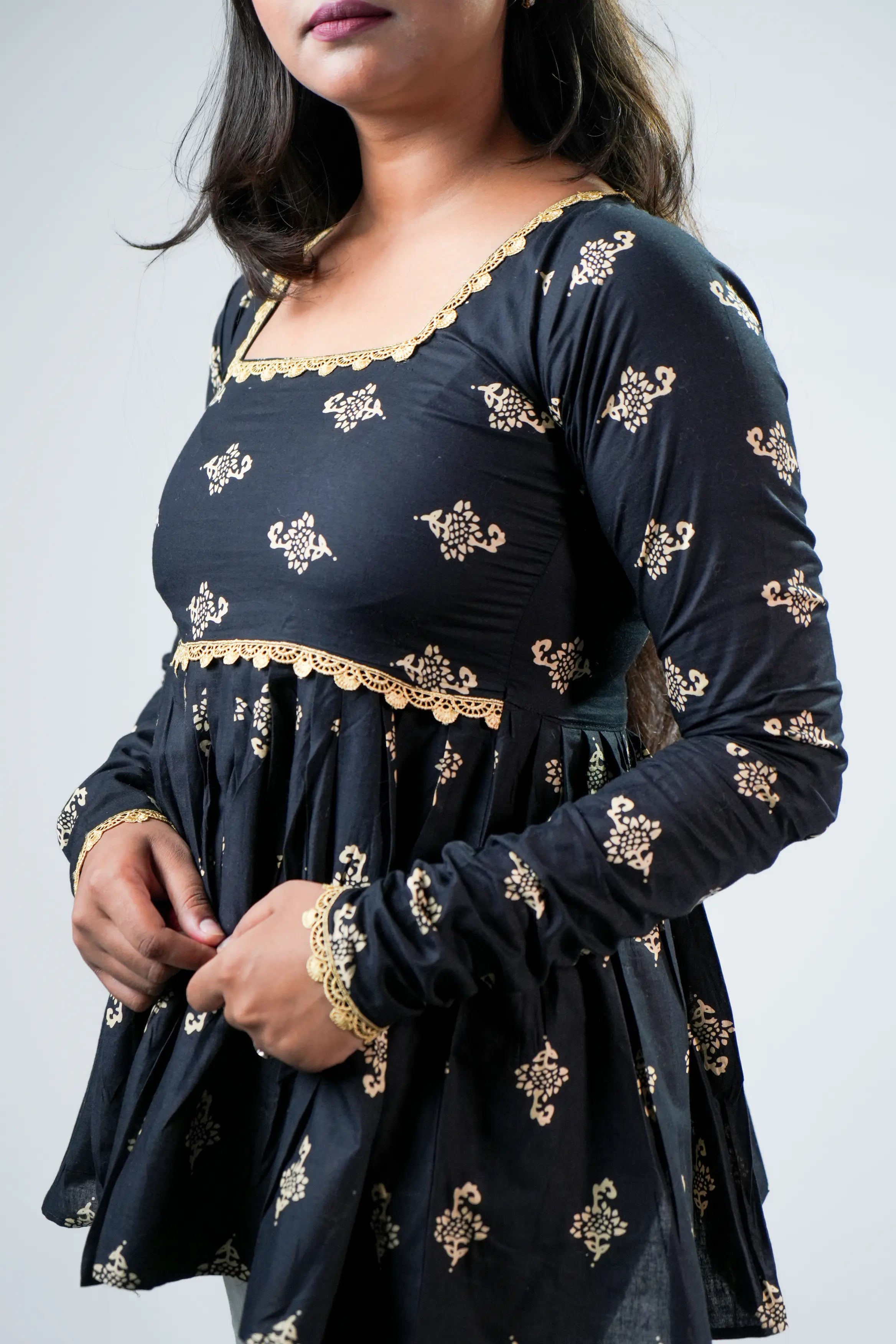 Black & Gold Printed Peplum Ethnic Top